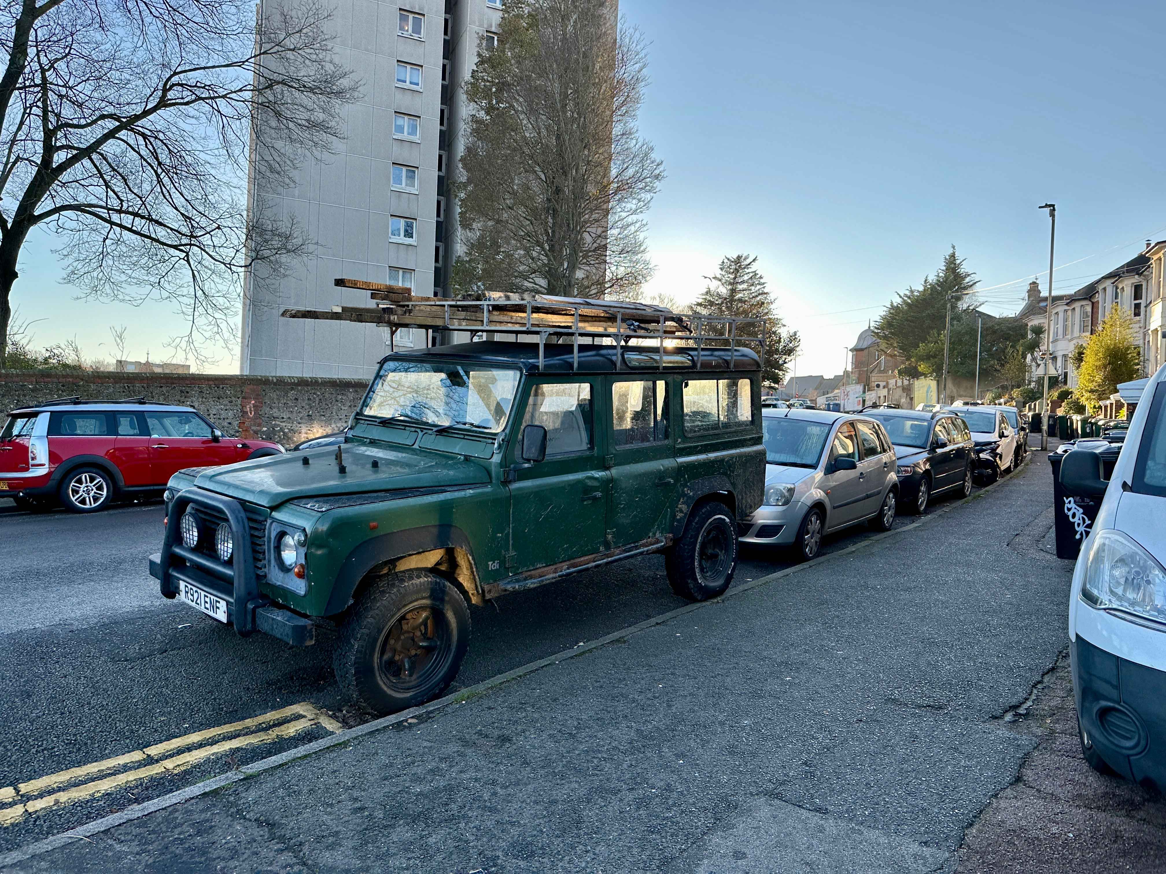 Photograph of R921 ENF - a Green Land Rover Defender parked in Hollingdean by a non-resident. The third of three photographs supplied by the residents of Hollingdean.