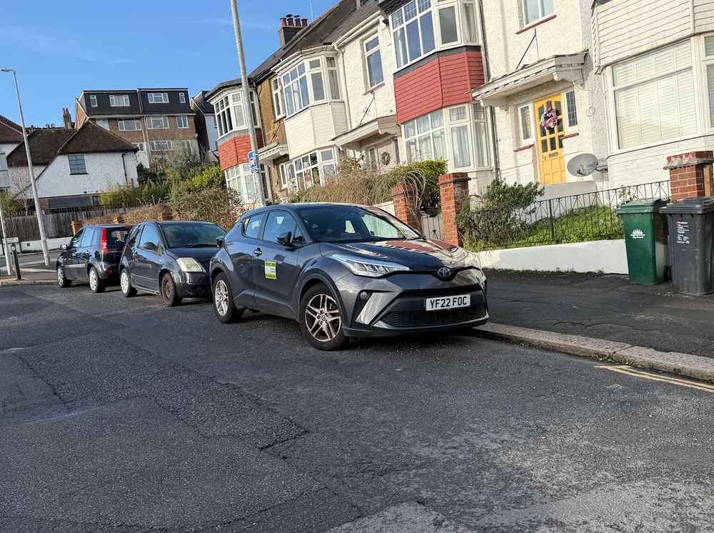 Photograph of YF22 FOC - a Grey Toyota C-HR taxi parked in Hollingdean by a non-resident. The ninth of nine photographs supplied by the residents of Hollingdean.