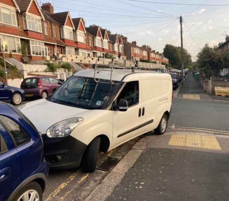 Photograph of HV13 JVP - a White Vauxhall Combo parked in Hollingdean by a non-resident. The second of two photographs supplied by the residents of Hollingdean.