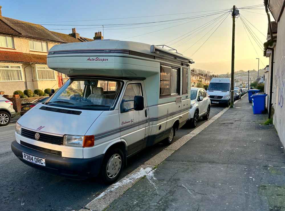 Photograph of R384 ORC - a Beige Volkswagen Transporter camper van parked in Hollingdean by a non-resident, and potentially abandoned. The eleventh of thirteen photographs supplied by the residents of Hollingdean.