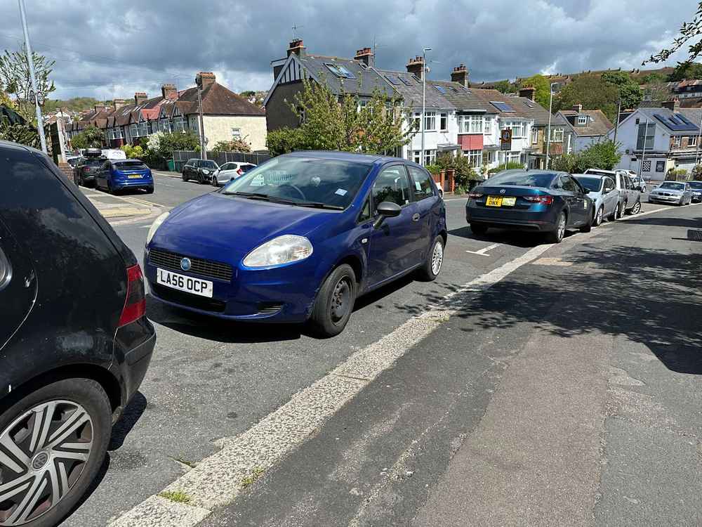 Photograph of LA56 OCP - a Blue Fiat Punto parked in Hollingdean by a non-resident, and potentially abandoned. The fifth of six photographs supplied by the residents of Hollingdean.