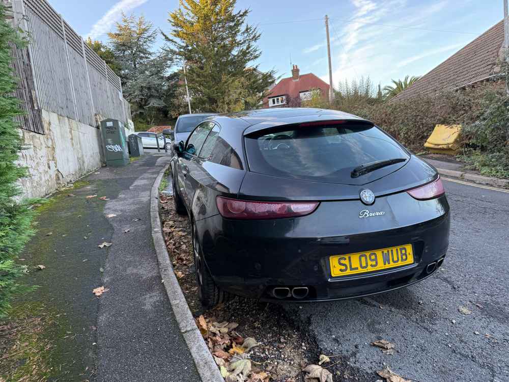 Photograph of SL09 WUB - a Black Alfa Romeo Brera parked in Hollingdean by a non-resident. The thirty-ninth of forty-three photographs supplied by the residents of Hollingdean.