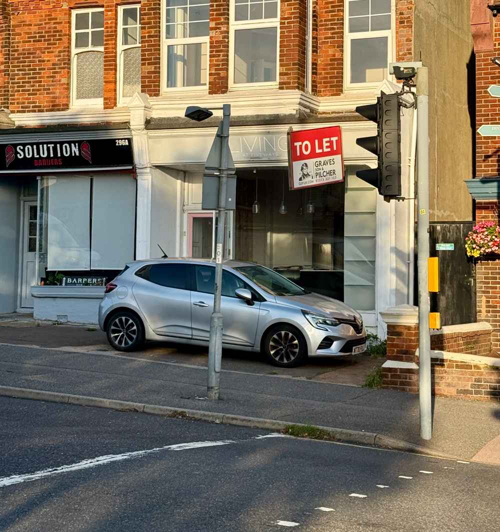 Photograph of MT70 FUJ - a Silver Renault Clio parked in Hollingdean by a non-resident. The fourth of five photographs supplied by the residents of Hollingdean.