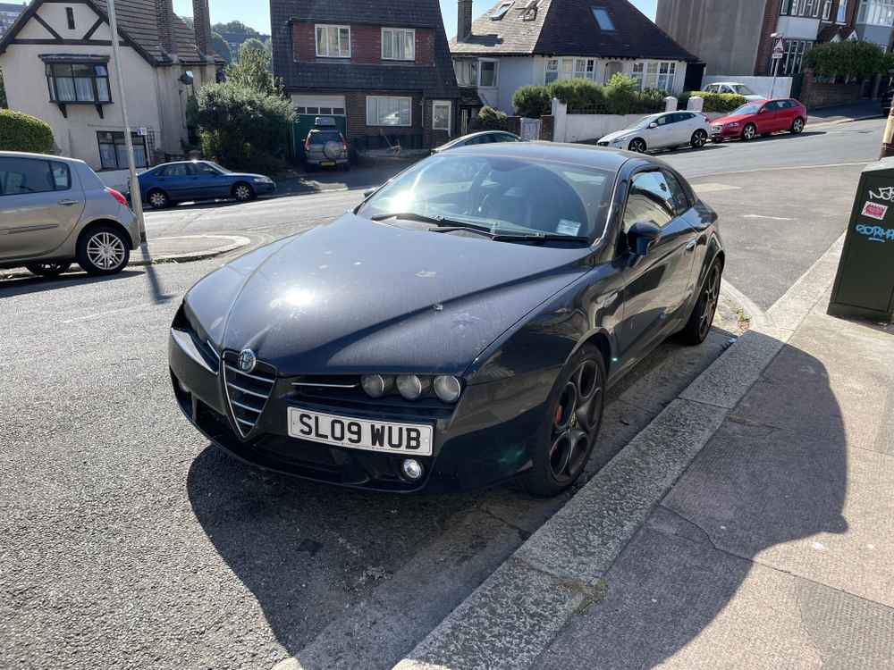 Photograph of SL09 WUB - a Black Alfa Romeo Brera parked in Hollingdean by a non-resident. The eighth of twenty-six photographs supplied by the residents of Hollingdean.