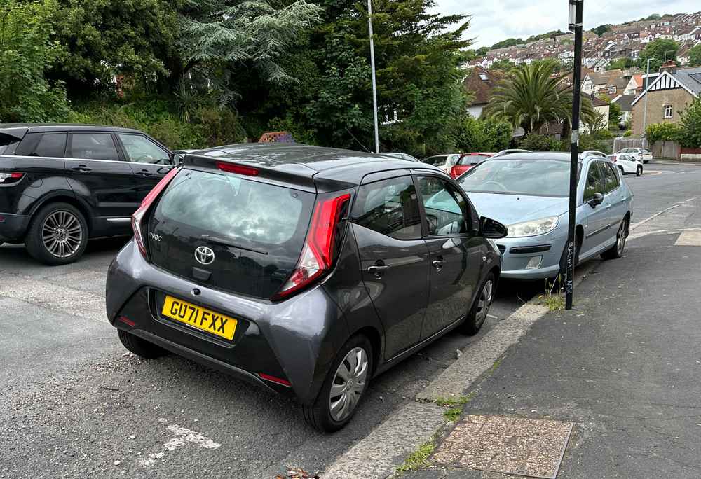 Photograph of GU71 FXX - a Grey Toyota Aygo parked in Hollingdean by a non-resident who uses the local area as part of their Brighton commute. The second of six photographs supplied by the residents of Hollingdean.