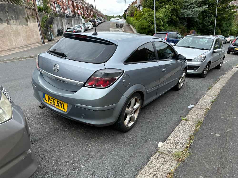 Photograph of LV56 BKL - a Blue Vauxhall Astra parked in Hollingdean by a non-resident, and potentially abandoned. The second of five photographs supplied by the residents of Hollingdean.