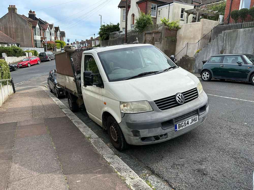 Photograph of BG54 JHU - a White Volkswagen T-Sporter parked in Hollingdean by a non-resident. The eleventh of thirty-two photographs supplied by the residents of Hollingdean.