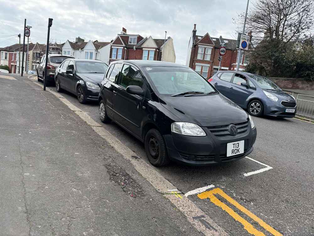 Photograph of T13 ROK - a Black Volkswagen Fox parked in Hollingdean by a non-resident. The sixth of six photographs supplied by the residents of Hollingdean.