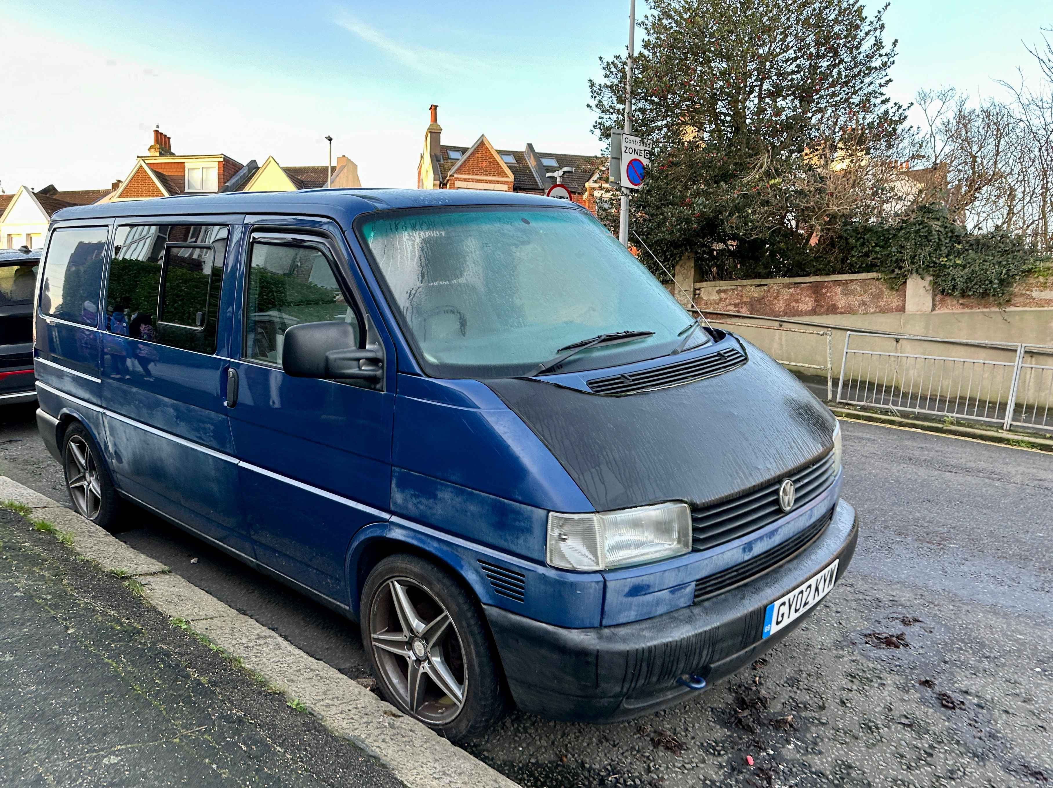 Photograph of GY02 KYW - a Blue Volkswagen Transporter camper van parked in Hollingdean by a non-resident. The eighteenth of eighteen photographs supplied by the residents of Hollingdean.
