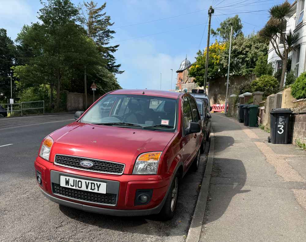 Photograph of WJ10 VDY - a Red Ford Fusion parked in Hollingdean by a non-resident. The third of three photographs supplied by the residents of Hollingdean.