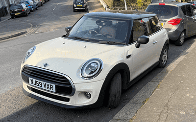 NJ69 VXR, a Beige Mini Cooper parked in Hollingdean