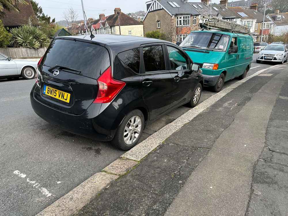 Photograph of BW15 VNJ - a Black Nissan Note parked in Hollingdean by a non-resident who uses the local area as part of their Brighton commute. The seventeenth of twenty-two photographs supplied by the residents of Hollingdean.
