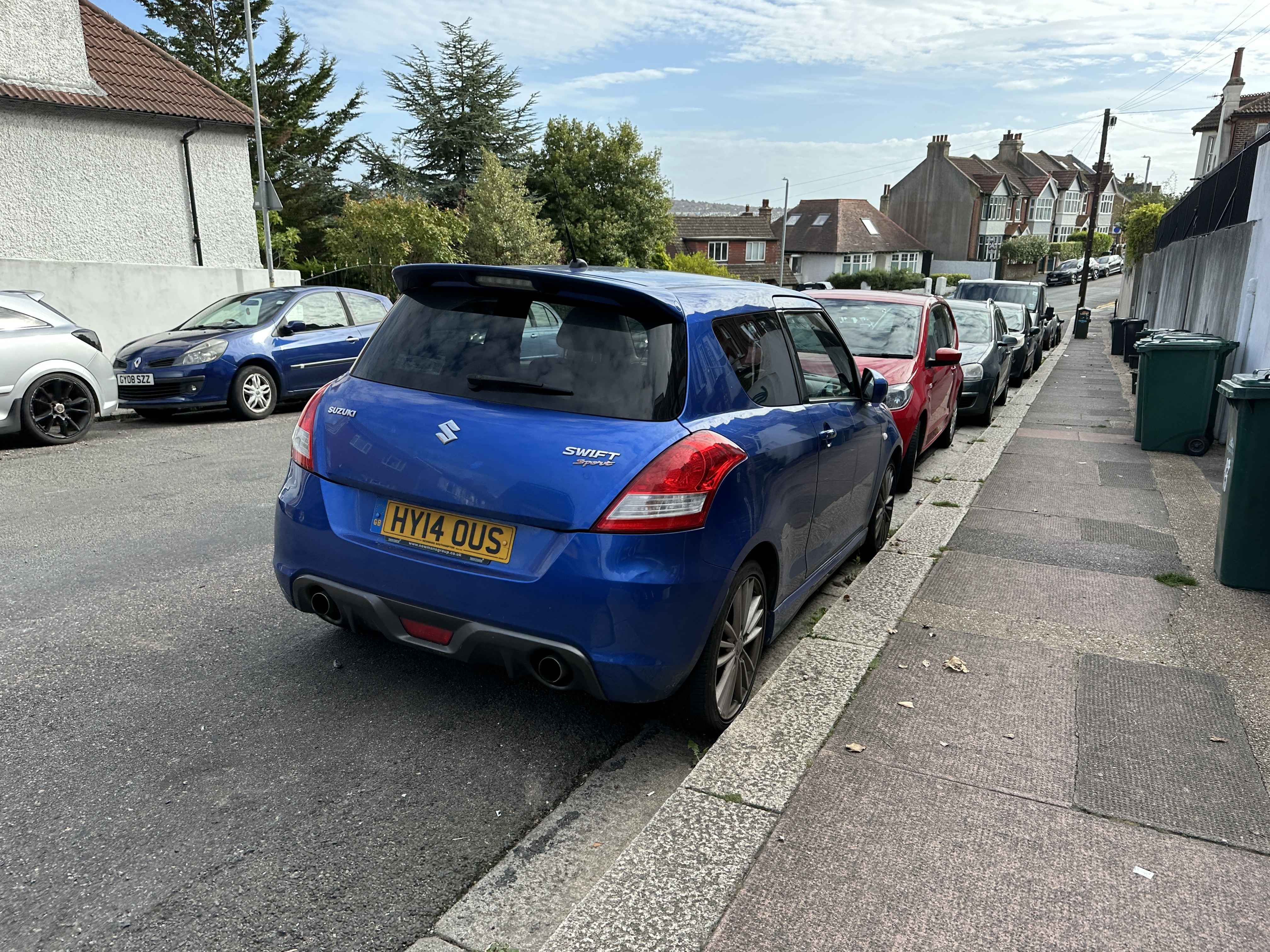 Photograph of HY14 OUS - a Blue Suzuki Swift parked in Hollingdean by a non-resident. The third of four photographs supplied by the residents of Hollingdean.