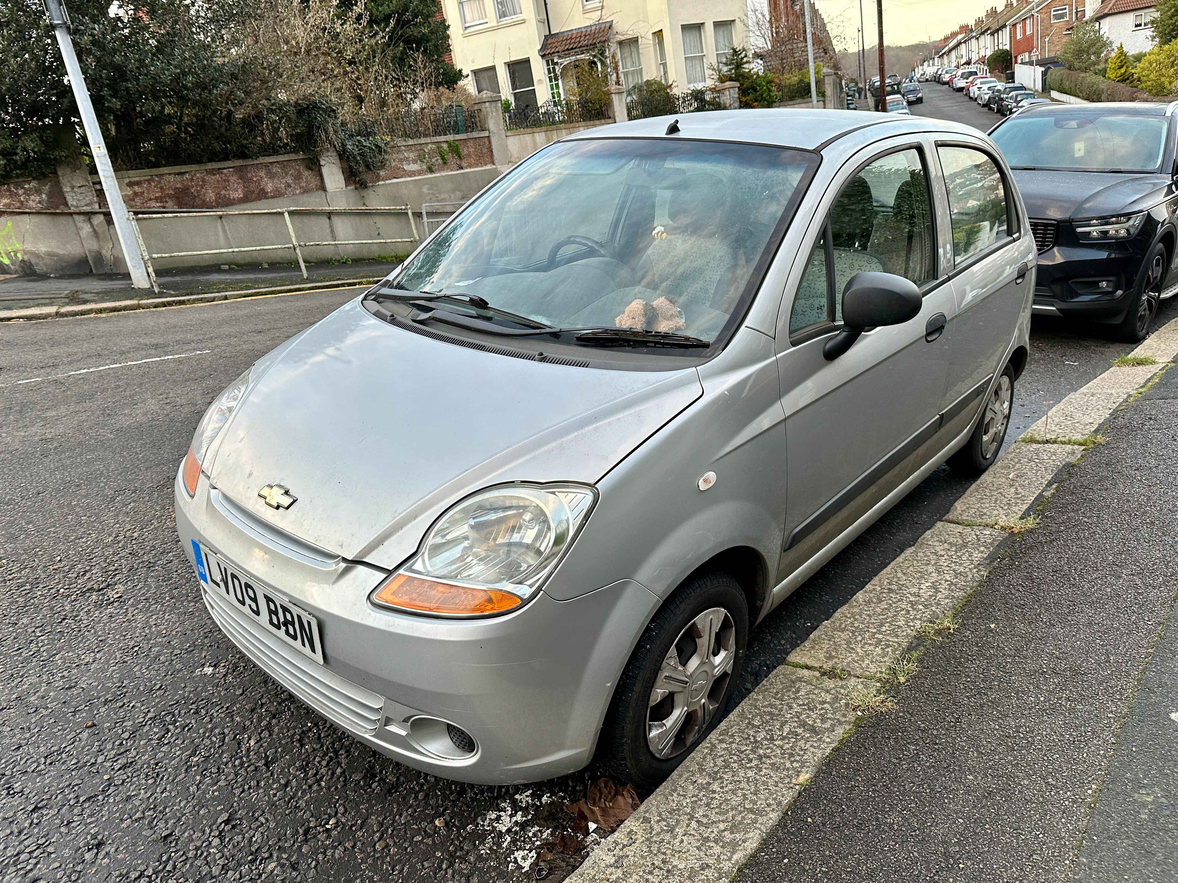 Photograph of LV09 BBN - a Silver Chevrolet Matiz parked in Hollingdean by a non-resident. The second of three photographs supplied by the residents of Hollingdean.