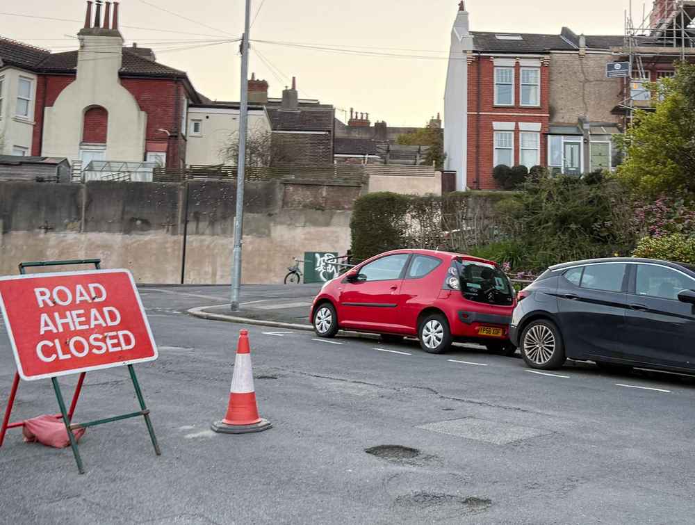 Photograph of YP58 XDF - a Red Citroen C1 parked in Hollingdean by a non-resident, and potentially abandoned. The twenty-first of twenty-two photographs supplied by the residents of Hollingdean.
