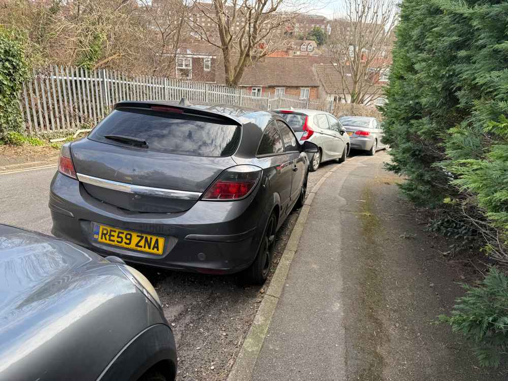 Photograph of RE59 ZNA - a Grey Vauxhall Astra parked in Hollingdean by a non-resident. The fourteenth of fourteen photographs supplied by the residents of Hollingdean.