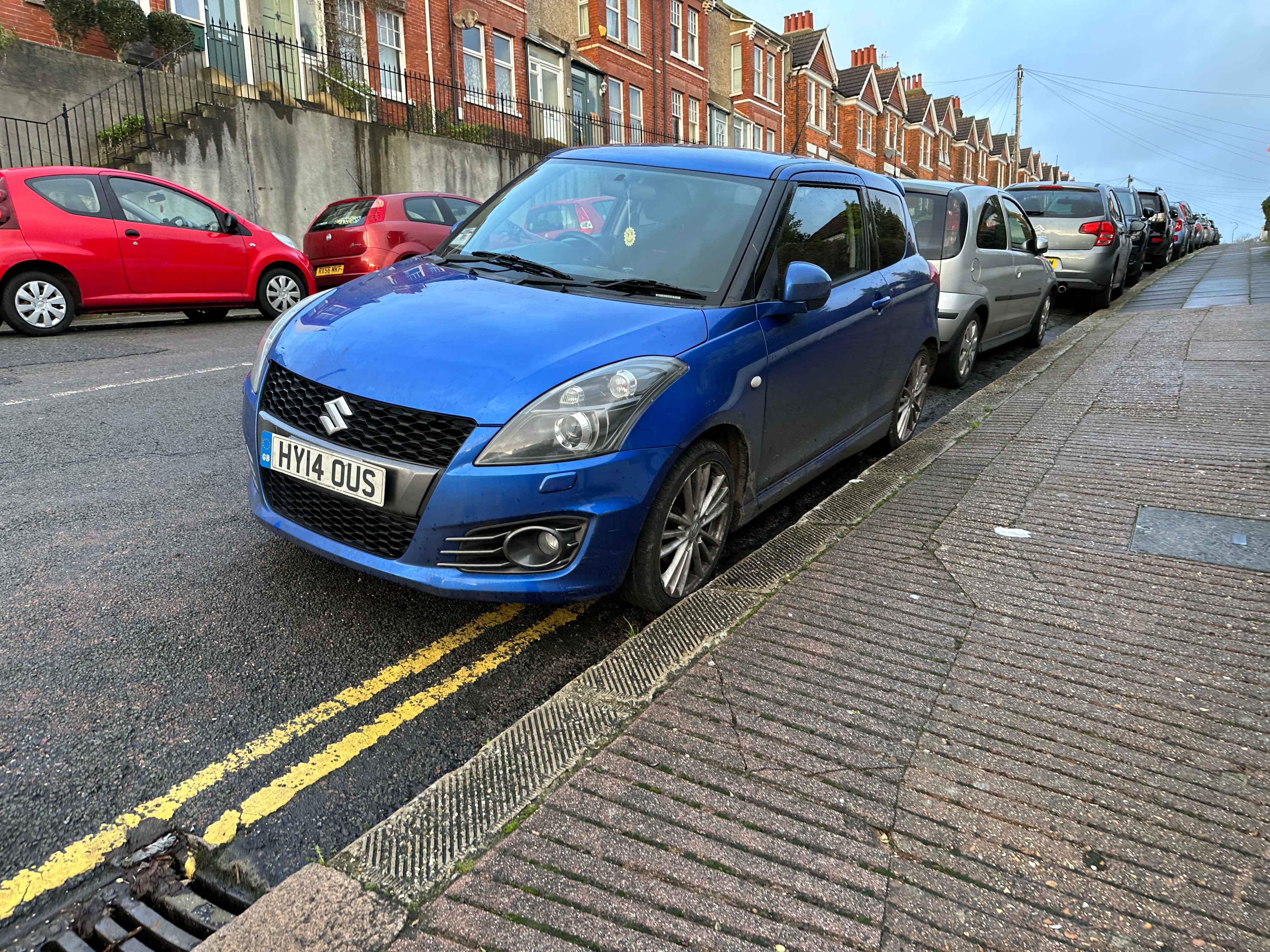 Photograph of HY14 OUS - a Blue Suzuki Swift parked in Hollingdean by a non-resident. The fourth of four photographs supplied by the residents of Hollingdean.