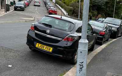 SJ08 RXB, a Black Vauxhall Astra parked in Hollingdean