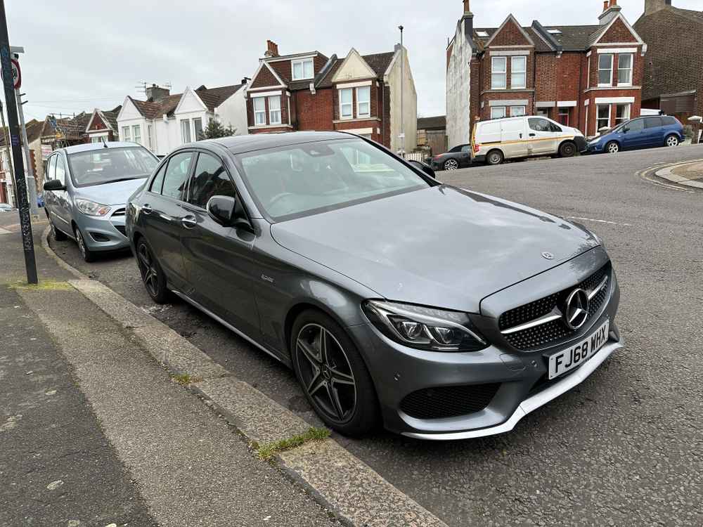Photograph of FJ68 WHX - a Grey Mercedes C Class parked in Hollingdean by a non-resident. The first of eight photographs supplied by the residents of Hollingdean.