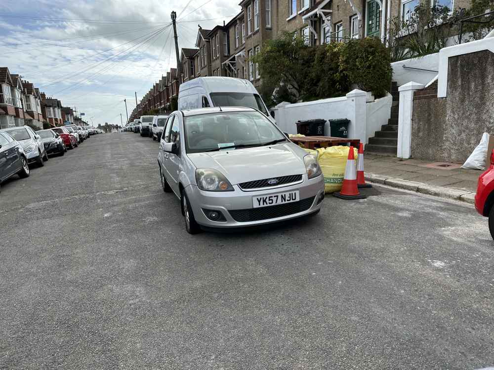 Photograph of YK57 NJU - a Silver Ford Fiesta parked in Hollingdean. The first of two photographs supplied by the residents of Hollingdean.