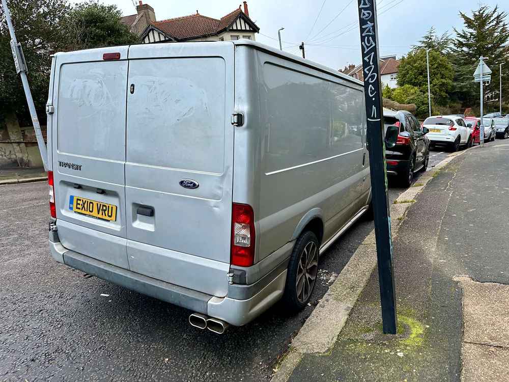 Photograph of EX10 VRU - a Silver Ford Transit parked in Hollingdean by a non-resident. The ninth of twenty-five photographs supplied by the residents of Hollingdean.