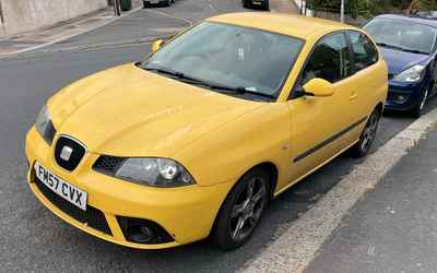 FM57 CVX, a Yellow Seat Ibiza parked in Hollingdean