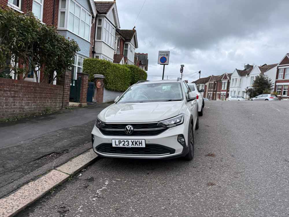 Photograph of LP23 XKH - a Grey Volkswagen Taigo parked in Hollingdean by a non-resident. The first of two photographs supplied by the residents of Hollingdean.