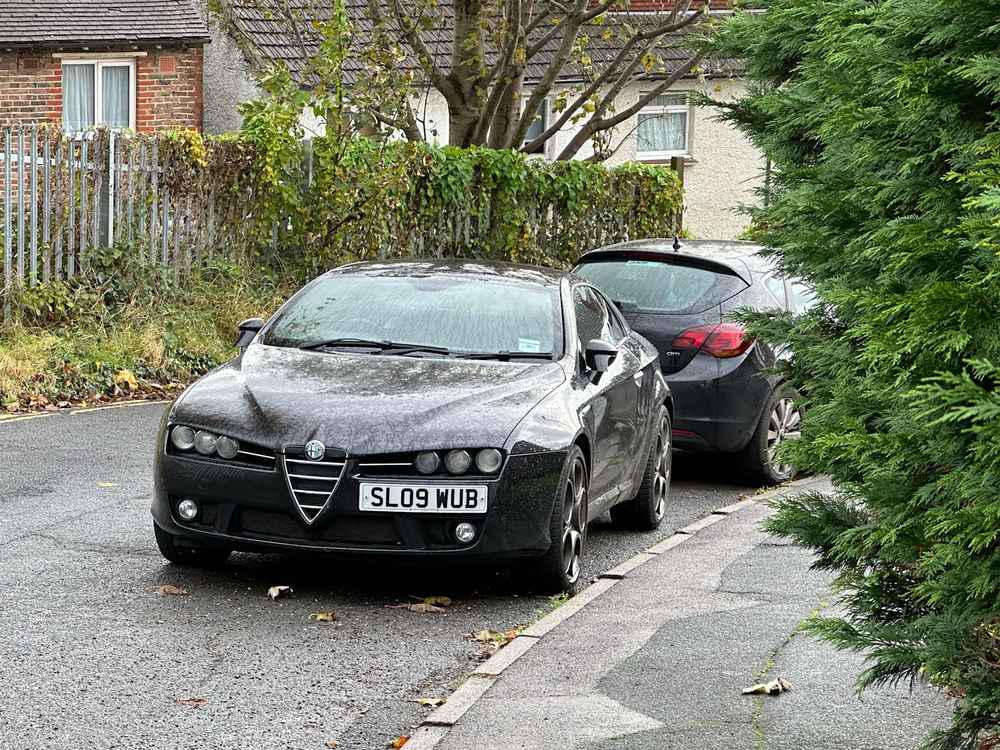 Photograph of SL09 WUB - a Black Alfa Romeo Brera parked in Hollingdean by a non-resident. The tenth of forty-four photographs supplied by the residents of Hollingdean.