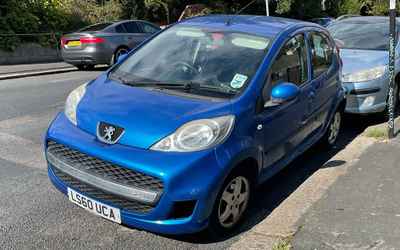LS60 UCA, a Blue Peugeot 107 parked in Hollingdean