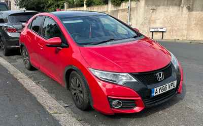AY66 VPL, a Red Honda Civic parked in Hollingdean