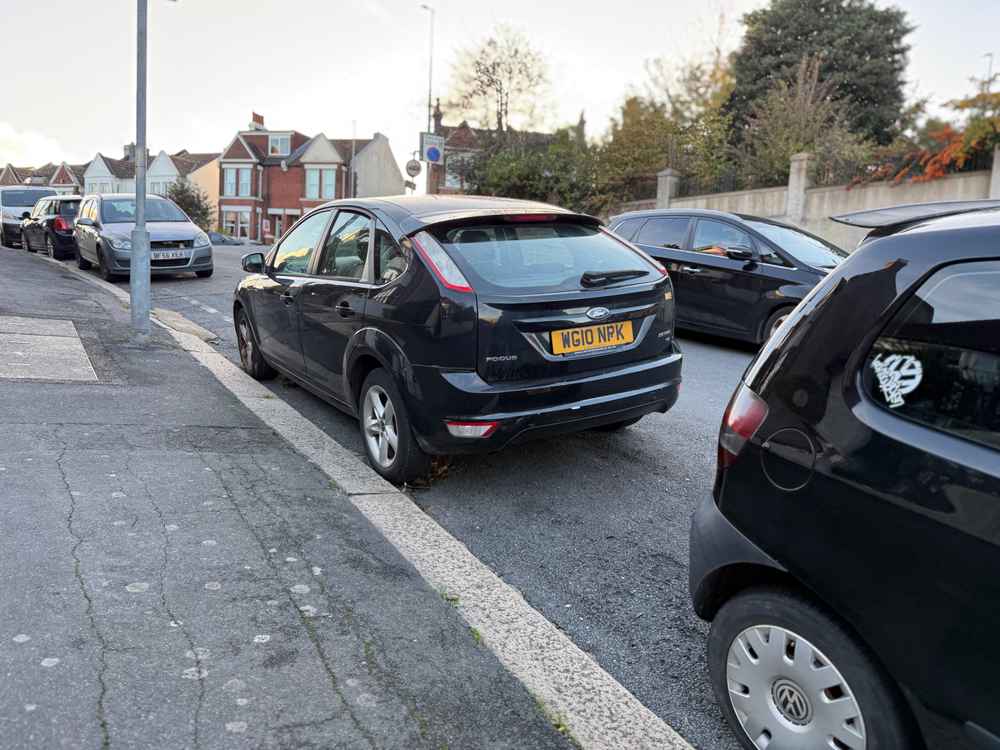 Photograph of WG10 NPK - a Black Ford Focus parked in Hollingdean by a non-resident. The thirteenth of thirteen photographs supplied by the residents of Hollingdean.