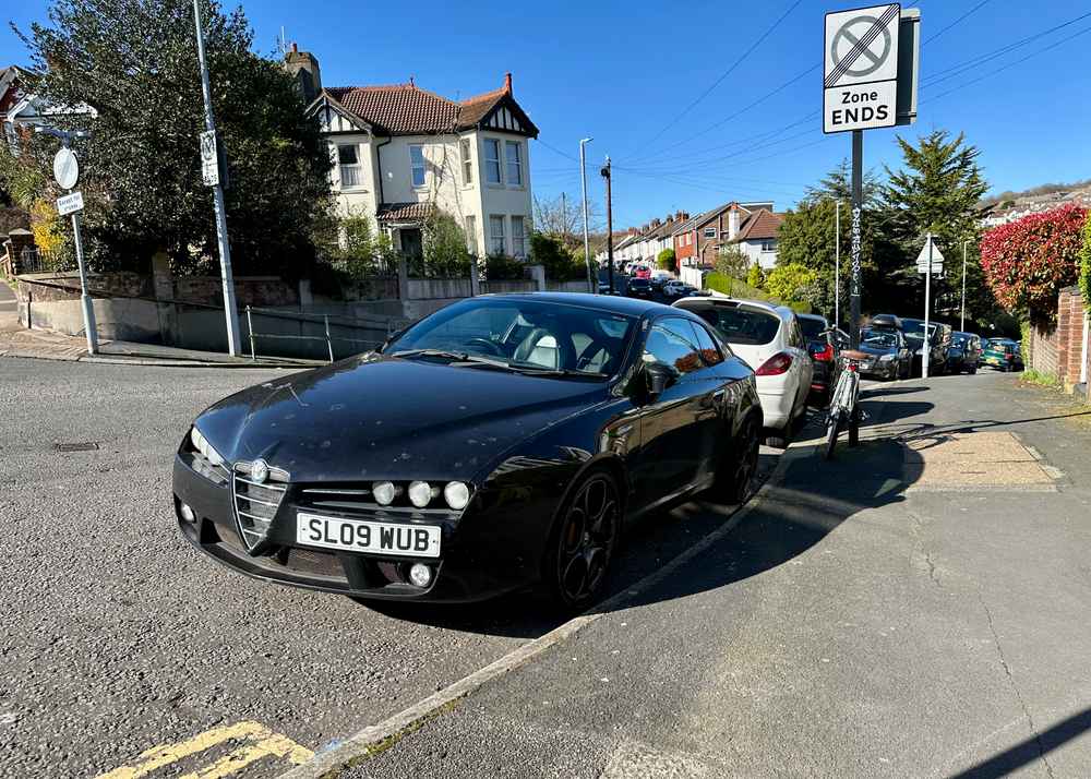 Photograph of SL09 WUB - a Black Alfa Romeo Brera parked in Hollingdean by a non-resident. The eighteenth of twenty-six photographs supplied by the residents of Hollingdean.