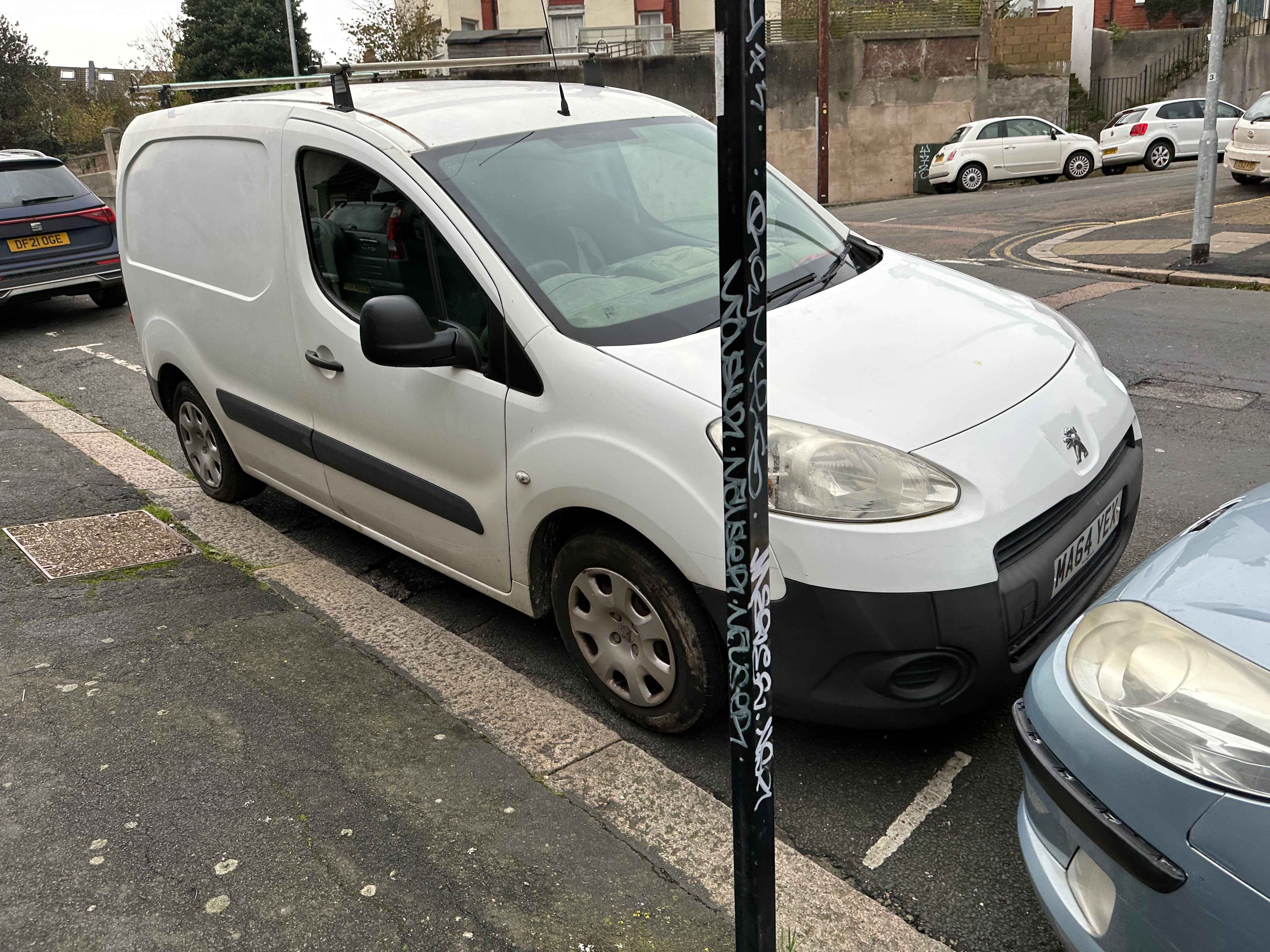 Photograph of MA64 YEX - a White Peugeot Partner parked in Hollingdean by a non-resident. The third of six photographs supplied by the residents of Hollingdean.