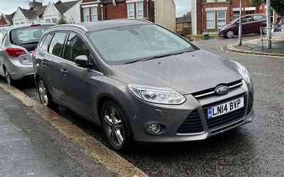 LN14 BVP, a Brown Ford Focus parked in Hollingdean