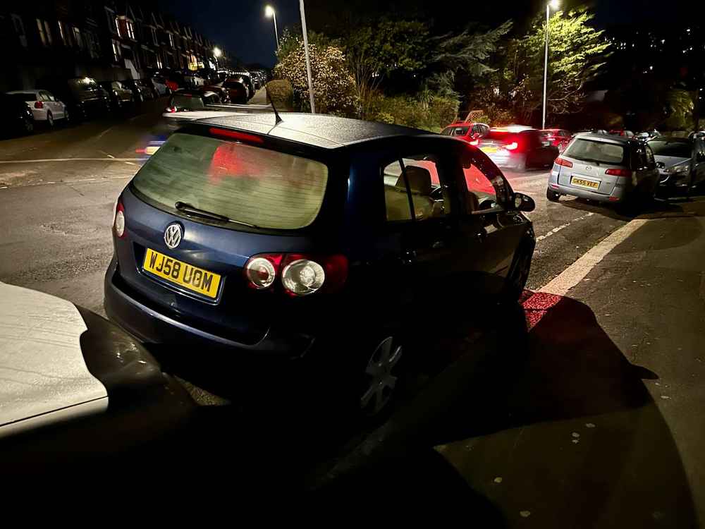 Photograph of WJ58 UOM - a Blue Volkswagen Golf parked in Hollingdean by a non-resident. The second of three photographs supplied by the residents of Hollingdean.