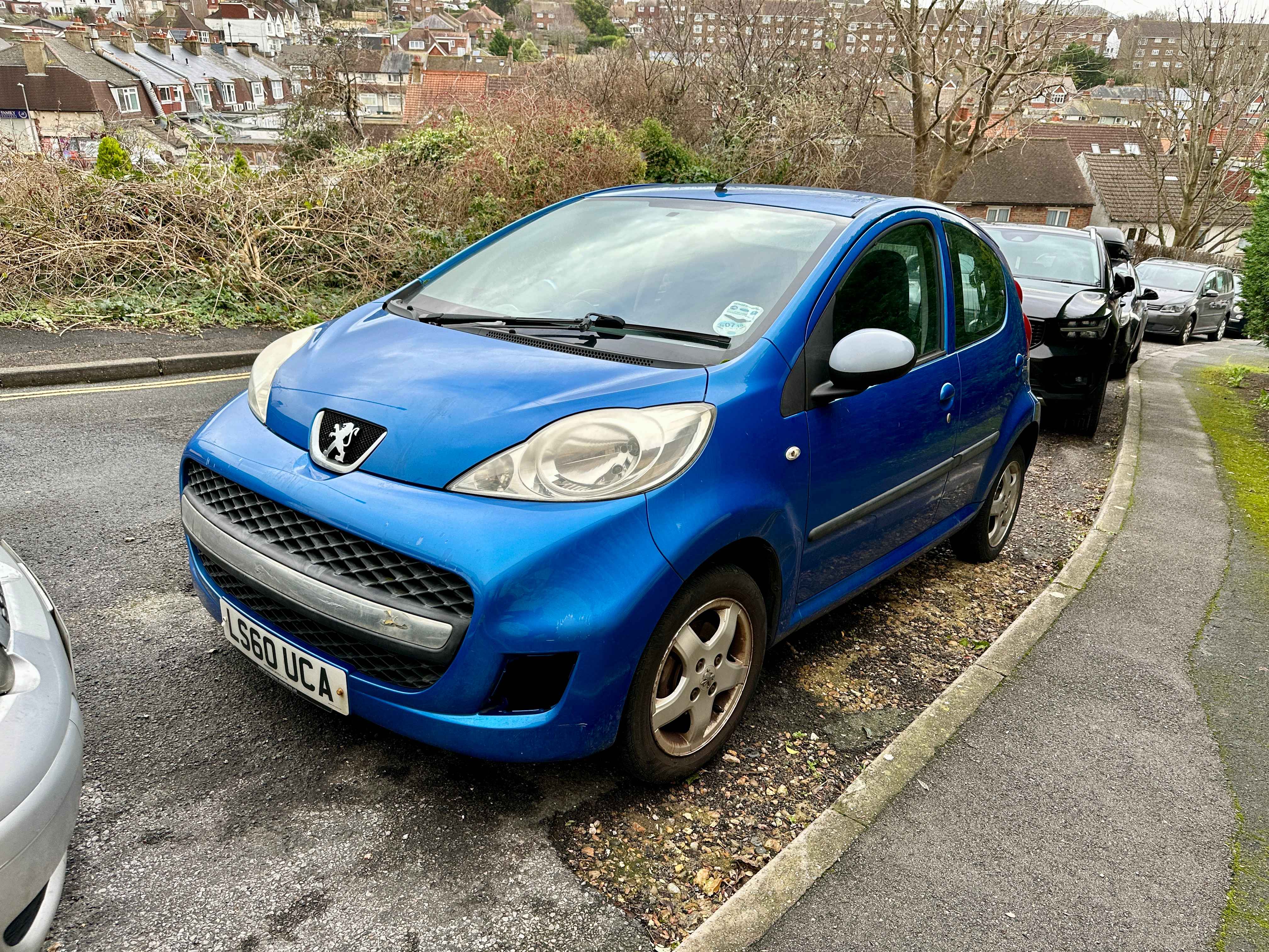 Photograph of LS60 UCA - a Blue Peugeot 107 parked in Hollingdean by a non-resident. The seventh of seven photographs supplied by the residents of Hollingdean.
