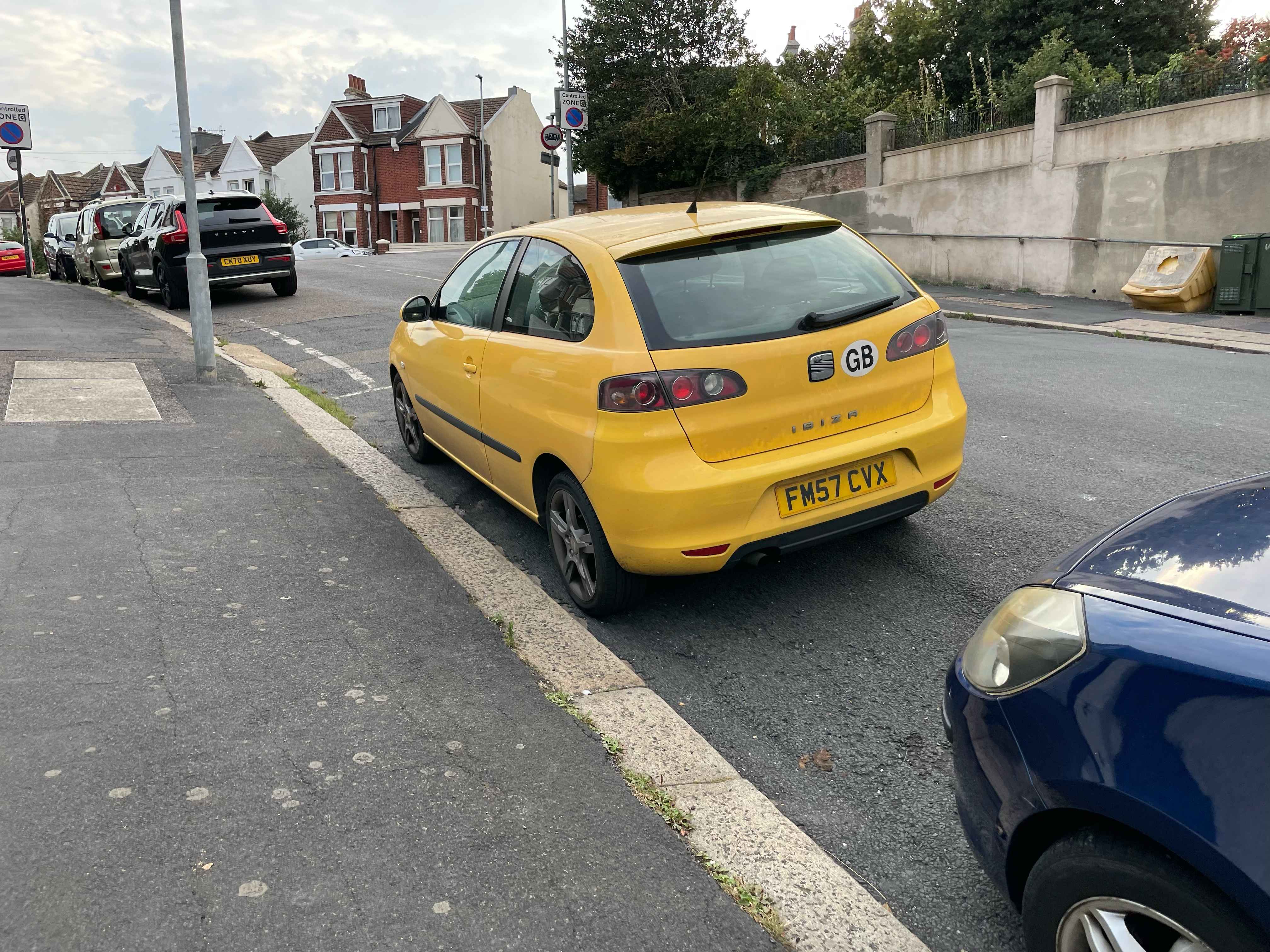 Photograph of FM57 CVX - a Yellow Seat Ibiza parked in Hollingdean by a non-resident. The second of two photographs supplied by the residents of Hollingdean.