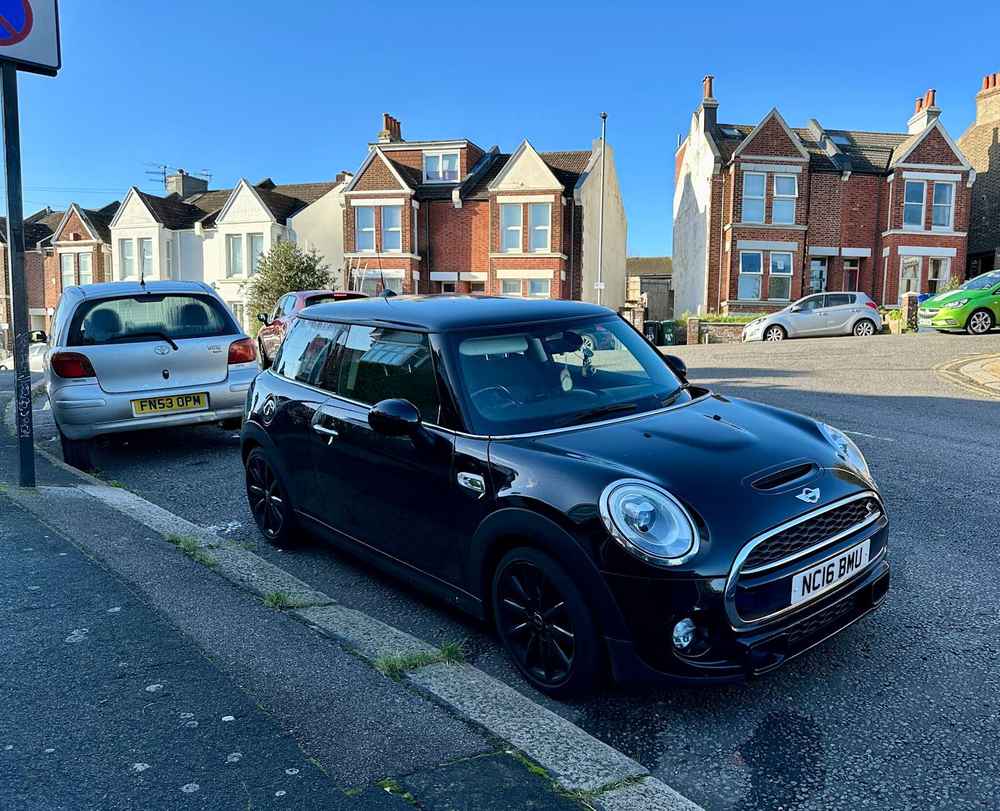 Photograph of NC16 BMU - a Black Mini Cooper parked in Hollingdean by a non-resident who uses the local area as part of their Brighton commute. The third of thirteen photographs supplied by the residents of Hollingdean.