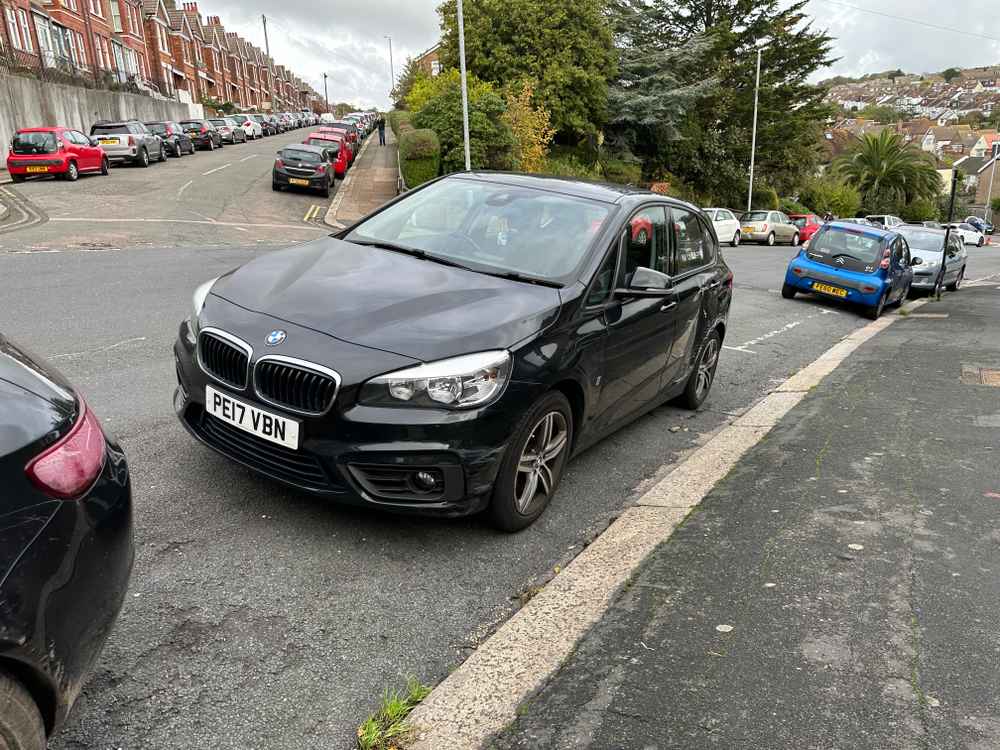 Photograph of PE17 VBN - a Black BMW 2 Series parked in Hollingdean by a non-resident. The second of three photographs supplied by the residents of Hollingdean.