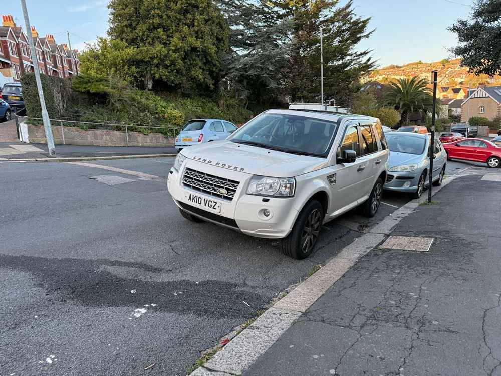 Photograph of AK10 VGZ - a White Land Rover Freelander parked in Hollingdean by a non-resident. The eleventh of thirteen photographs supplied by the residents of Hollingdean.