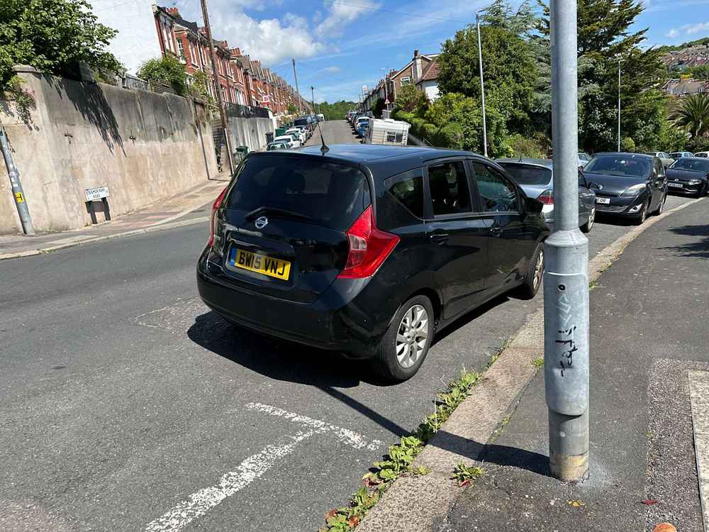 Photograph of BW15 VNJ - a Black Nissan Note parked in Hollingdean by a non-resident who uses the local area as part of their Brighton commute. The nineteenth of twenty-two photographs supplied by the residents of Hollingdean.