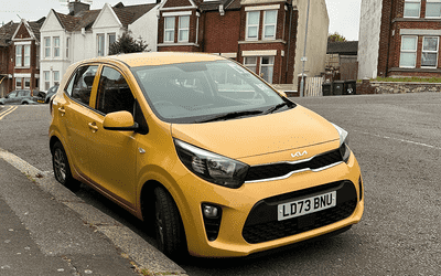 LD73 BNU, a Yellow Kia Picanto parked in Hollingdean