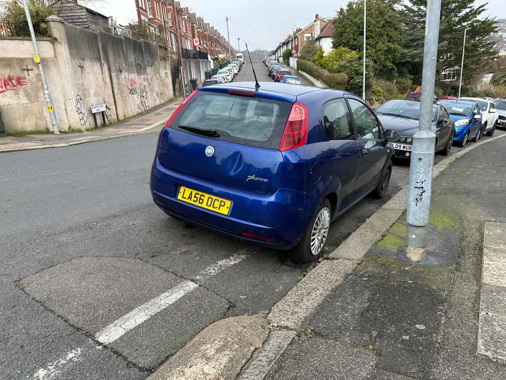 Photograph of LA56 OCP - a Blue Fiat Punto parked in Hollingdean by a non-resident, and potentially abandoned. The fourth of six photographs supplied by the residents of Hollingdean.