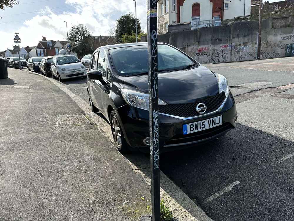 Photograph of BW15 VNJ - a Black Nissan Note parked in Hollingdean by a non-resident who uses the local area as part of their Brighton commute. The sixteenth of twenty-two photographs supplied by the residents of Hollingdean.