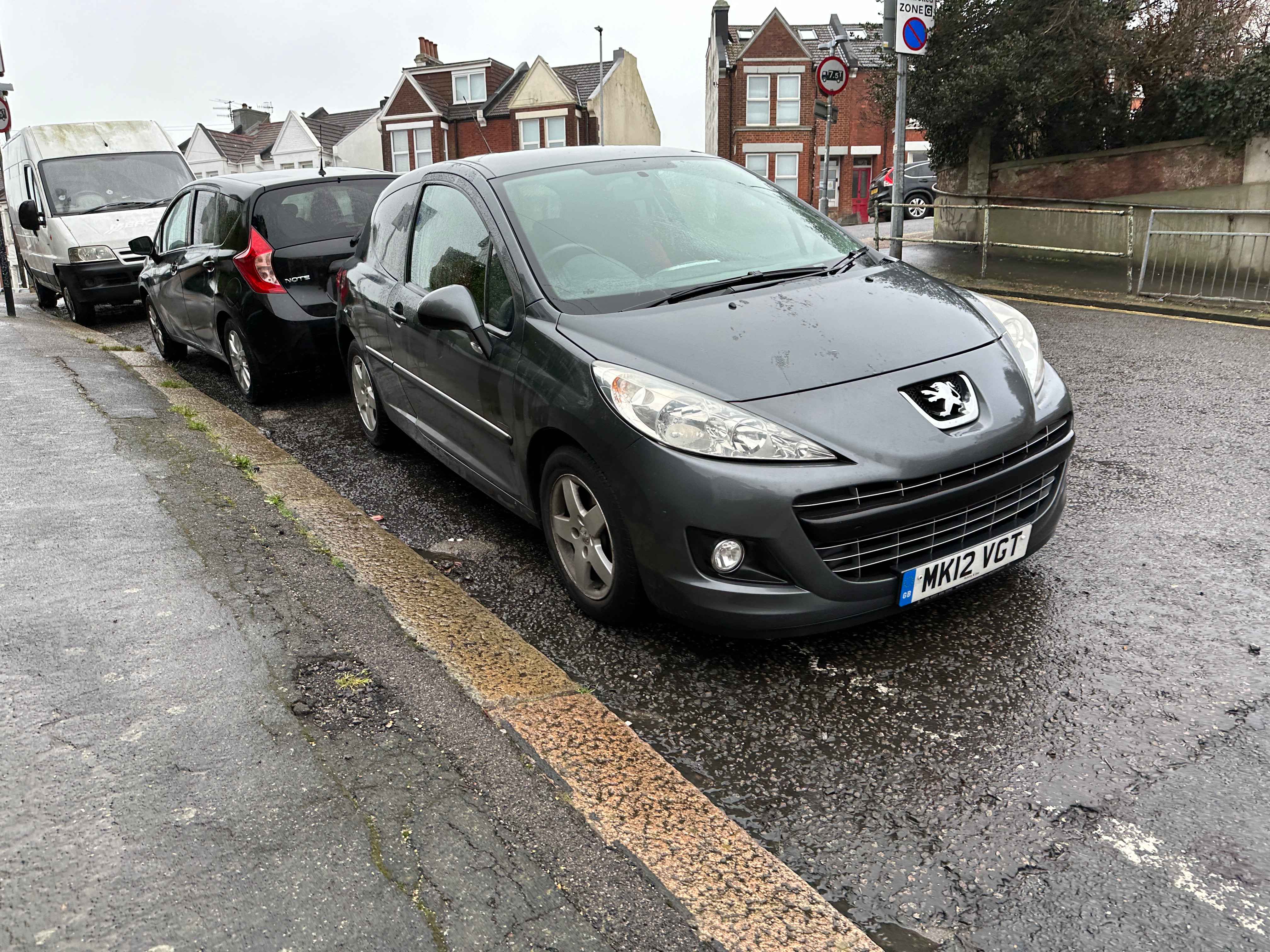 Photograph of MK12 VGT - a Grey Peugeot 207 parked in Hollingdean by a non-resident who uses the local area as part of their Brighton commute. The sixth of six photographs supplied by the residents of Hollingdean.