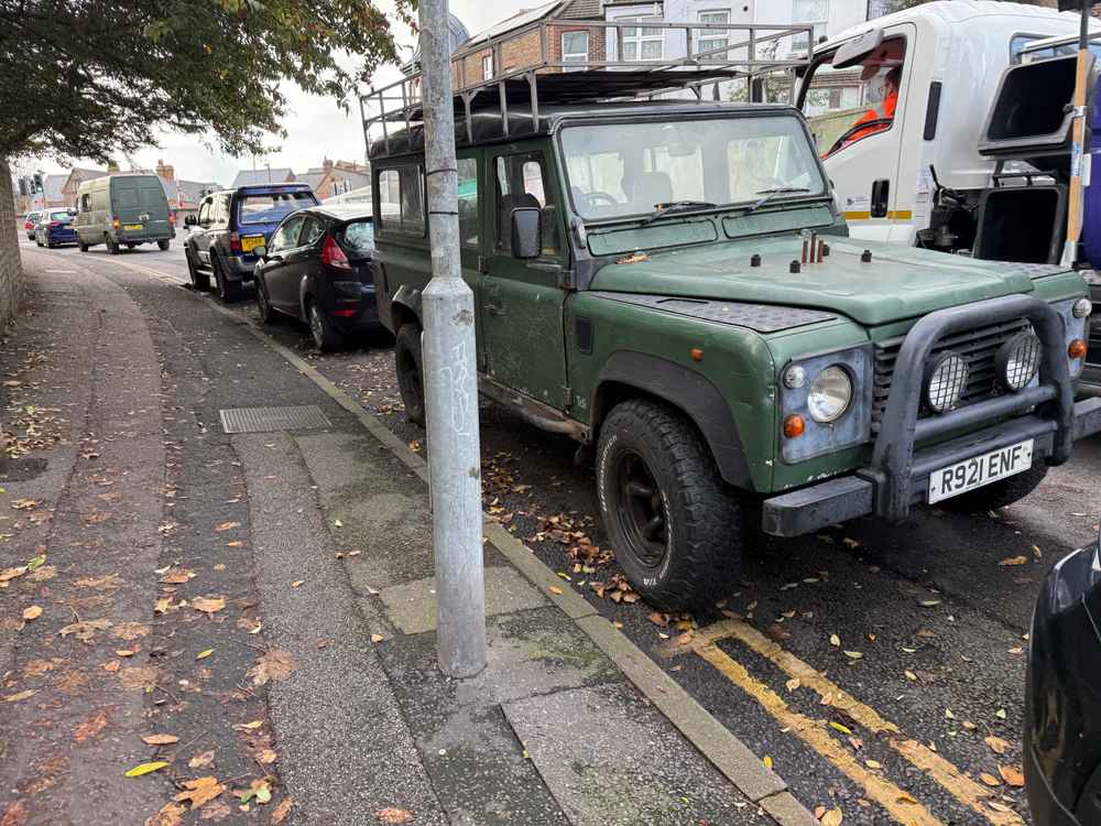 Photograph of R921 ENF - a Green Land Rover Defender parked in Hollingdean by a non-resident. The tenth of ten photographs supplied by the residents of Hollingdean.