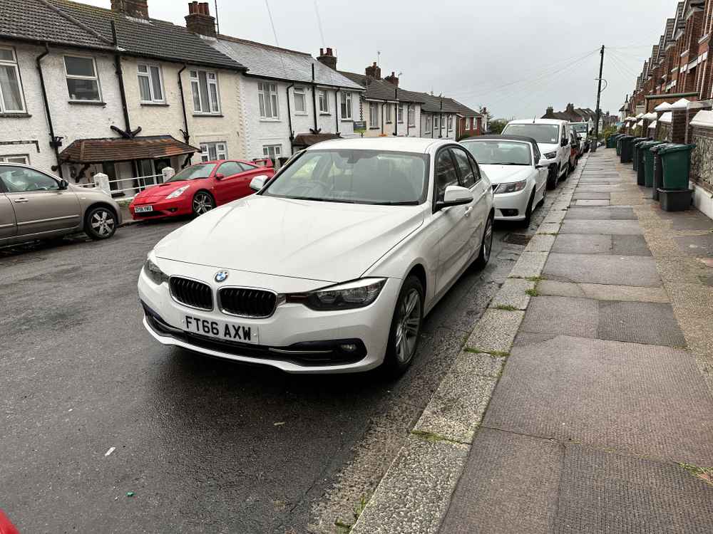 Photograph of FT66 AXW - a White BMW 3 Series parked in Hollingdean by a non-resident who uses the local area as part of their Brighton commute. The first of nine photographs supplied by the residents of Hollingdean.