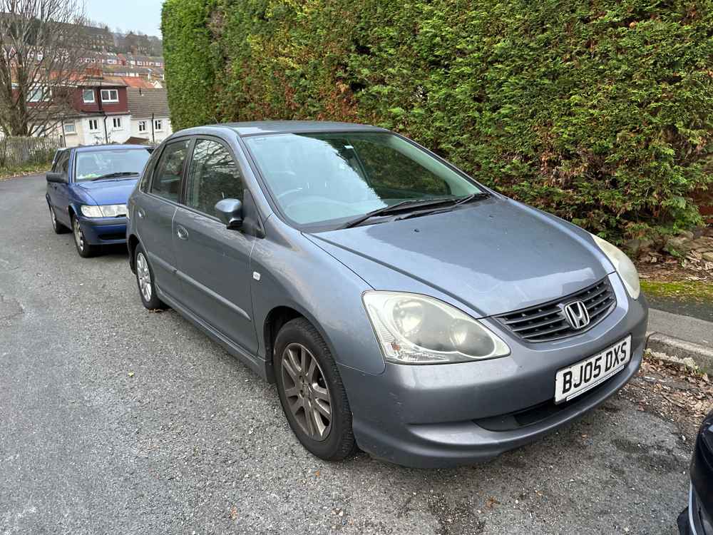 Photograph of BJ05 DXS - a Grey Honda Civic parked in Hollingdean by a non-resident. The first of two photographs supplied by the residents of Hollingdean.