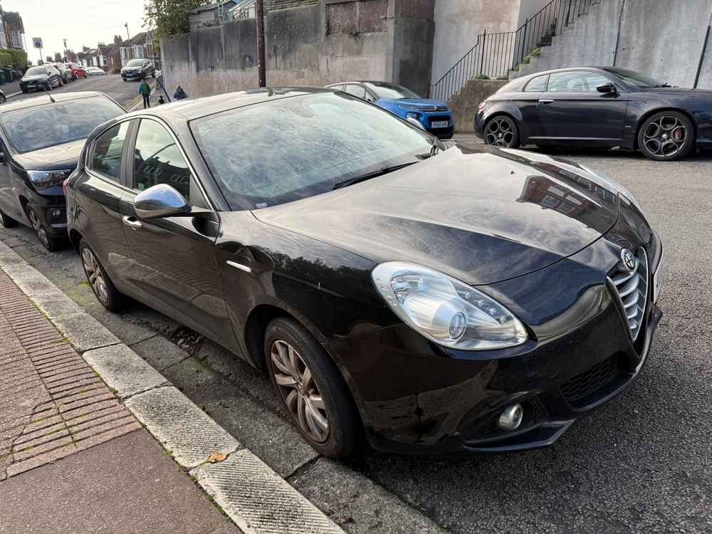 Photograph of VU15 KNV - a Black Alfa Romeo Giulietta parked in Hollingdean by a non-resident. The thirty-first of thirty-one photographs supplied by the residents of Hollingdean.