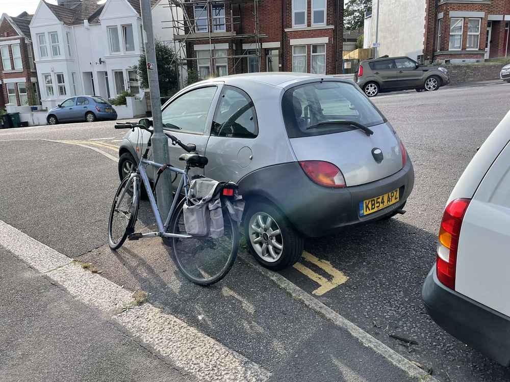 Photograph of KB54 APZ - a Purple Ford Ka parked in Hollingdean by a non-resident. 